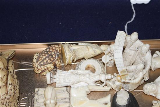 A group of assorted pre WWII ivory carving, mostly animals, together with several resin carvings